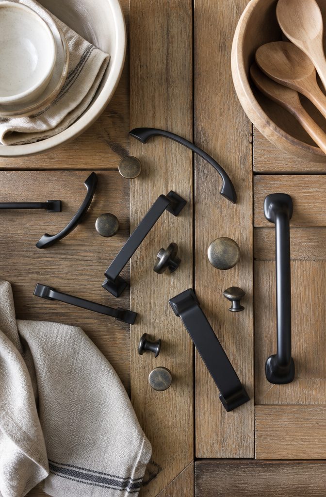 Rustic Kitchen Cabinets: Ideas for Wood, Paint and Hardware 10 Close-up of iron and bronze cabinet hardware in a rustic kitchen.