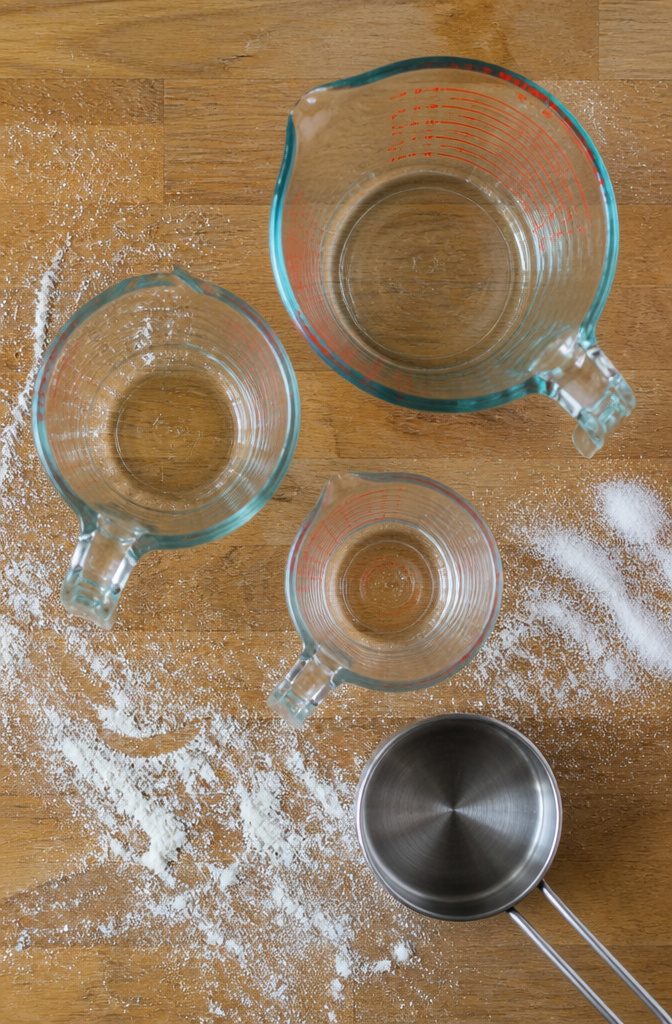 Essential Kitchen Tools: A Complete Guide for Home Cooks 7 Measuring cups for liquid and dry ingredients on a kitchen counter.